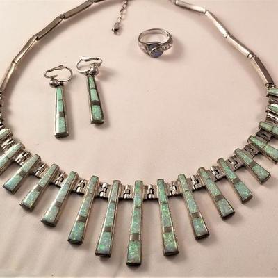 Unusual sterling and opal set - we have the original receipt - very heavy.