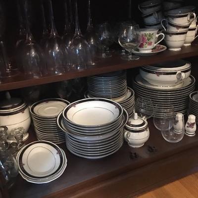 Noritake china service for 14 plus all serving dishes, teapot and coffee pot. 