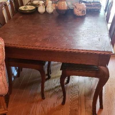 Antique Victorian French Style Carved Dining Table with 6 Chairs

Detached Table Base Pieces Included