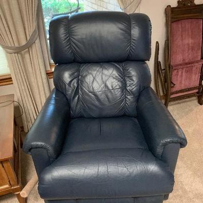 pair of blue leather lazy boy rocker recliners 