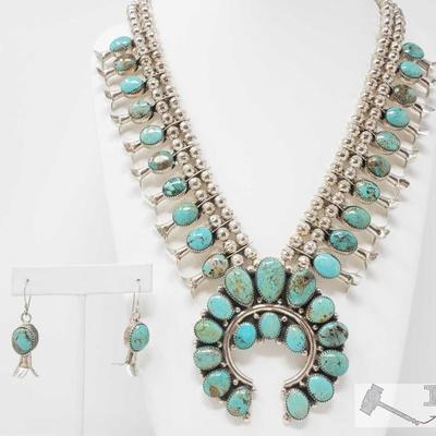 306: Charley Roanhorse Turquoise Mountain Turquoise Large Squash Blossom Necklace with Earrings, 191.2g
Sterling Silver | Genuine...