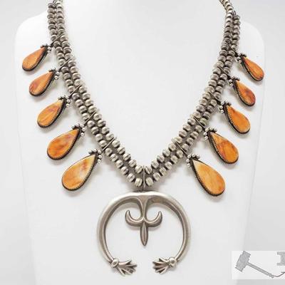 310: 	
Navajo Orange Spiny Squash Necklace Signed By Selena Warner, 99.3g,
Orange Spiny Oyster and Sterling Silver Squash Necklace....