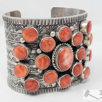 320: 	
Signed T. Jon Spiny Oyster & Sterling Silver Cuff/Bracelet 143.1g
What a beautiful one of a kind Cuff Signed by the famous artist...