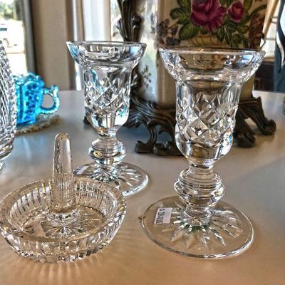 Wateford crystal round ring holder (signed) @ $20 and a pair of Waterford crystal single candlestick holders (signed) @ $40 for the pair.