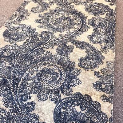 5 x 8 ft Persian style handmade wool rug Paisley design in blue on beige background. Originally purchased at Restoration Hardware for...