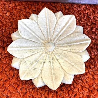 large flower carved out of stone $100