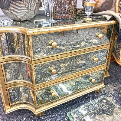 Gilded gold and mirrored 3-drawer dresser. Gorgeous piece. Estate sale price: $600