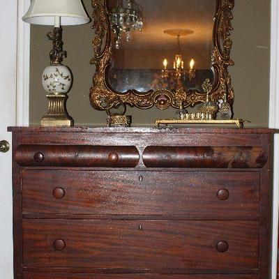 Antique American Empire Mahogany Chest.  Also shown is Bronze Gilt Ornate Mirror and a Cherub Table Lamp