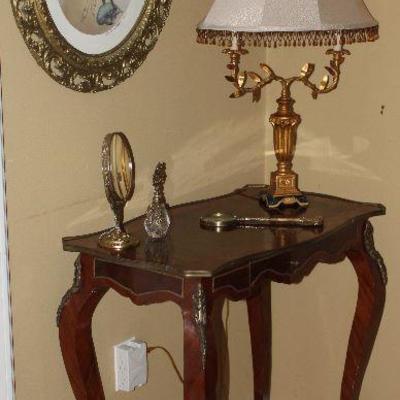 French Ladiesâ€™ Writing Desk with Ormolu Brass Mounts and Center Drawer. Also shown is a Vintage Italian Florentine 2 Arm Table Lamp and...