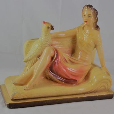 Vintage Signed Chalk-Ware Figurine: Lady on Sofa with Parrot (10â€W x 8.5â€H x 4â€D)