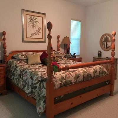 King bedroom with matching blanket chest and pair of nightstands