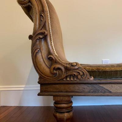 33. Antique Chaise with Carved Frame and Original Velvet Upholstery, 75 x 27 x 32, cushion is hard from age, holes in upholstery, trim is...
