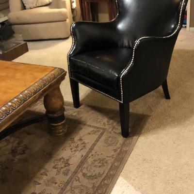 Rug and leather chair 