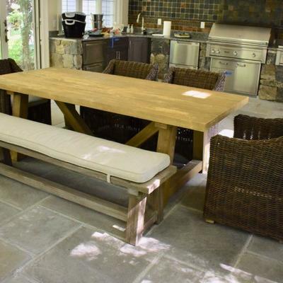 Restoration Hardware trestle table with bench and 4 wicker chairs