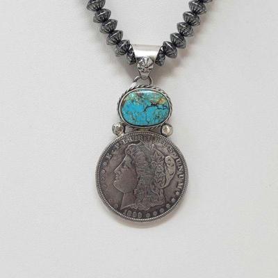 174: Beautiful Artist Marked Sterling Pendent with a Authentic Morgan Silver Dollar (chain not included)
Beautiful Artist Marked Sterling...
