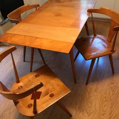 Mid Century Modern Paul McCobb table with three chairs. Two additional leaves (one in table in picture)