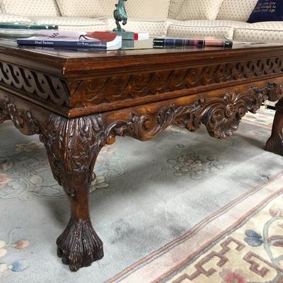 Large Mahogany Carved Square glasstop Coffee table
Price: $110