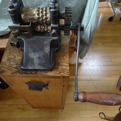 This is the antique candy machine from the Brach candy company being sold on silent bid. Joyce Wartmann was an heir to the Brach estate 