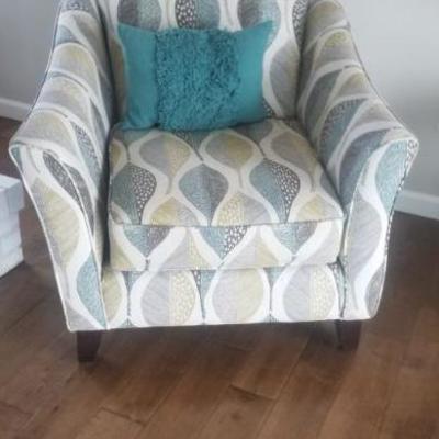 Decorative blue/tan fabric chair with accent pillow $75.00