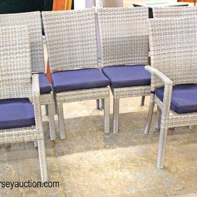  NEW â€œRST Furnitureâ€ 9 Piece Metal Patio Table with 8 Wicker Chairs with Cushions

Auction Estimate $500-$1000 â€“ Located Inside 