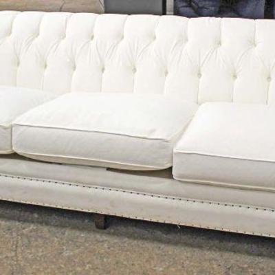  NEW â€œDistinction Furnitureâ€ White Upholstered Button Tufted Sofa with Tags

Auction Estimate $300-$600 â€“ Located Inside

  