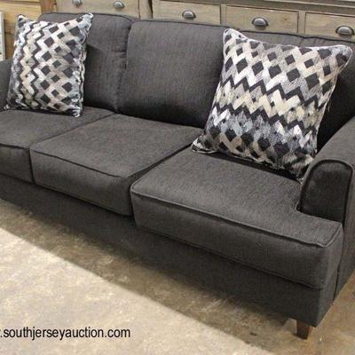  NEW Contemporary Black Upholstered Sofa with Decorator Pillows

Auction Estimate $300-$600 â€“ Located Inside 