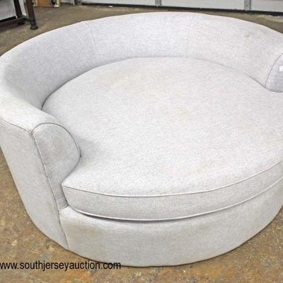  NEW Circular Grey Upholstered Fun Chair

Auction Estimate $200-$400 â€“ Located Inside 