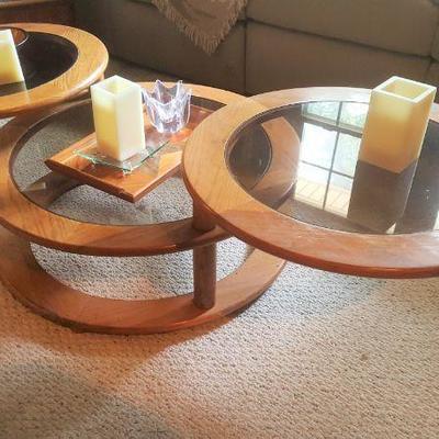 Trio wood circle coffee table.  Each piece slides together to form one column of circles