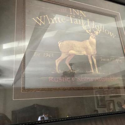 Neat framed poster, but the glare from every angle just killed it.  This would look great with the deer head taxidermy!