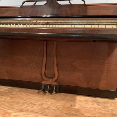 Wurlitzer upright piano 208923 with bench 
$300