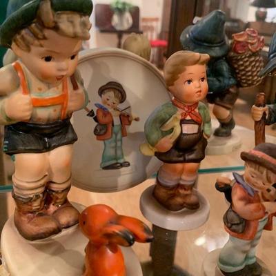 Lot of 4 Hummel figurines and small plate $75