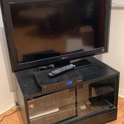 Sony 32â€ flat screen TV w/ stand and Panasonic VHS player $75