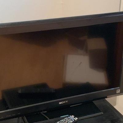 Sony 32â€ flat screen TV w/ stand and Panasonic VHS player $75