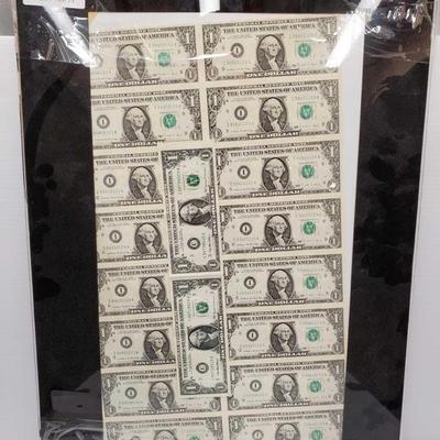 755: 755: Uncut Sheet of Eighteen One-Dollar Bills in Frame
Eighteen One-Dollar Bills in Frame