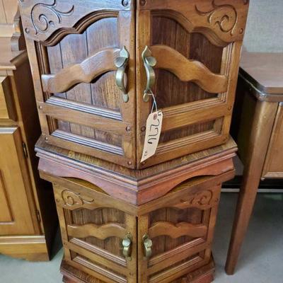 276: Two Wood Nightstands w/ Carved Wood Design
Two Hex shaped Wood Nightstands w/ Carved Wood Design and front facing cabinet doors