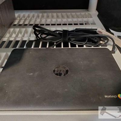 803: Black HP ChromeBook W/ Charging Cable
Black HP ChromeBook W/ Charging Cable