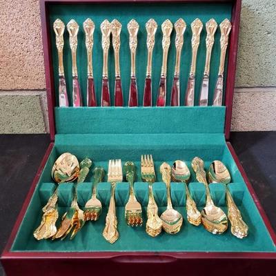  754: 61 Piece Gold Colored Stainless Steel Flatware Set