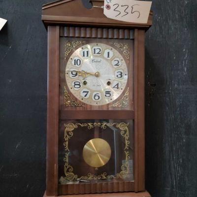 335: Antique Centurion Wood Wall Clock
Intricate Pattern Face with pendulum arm