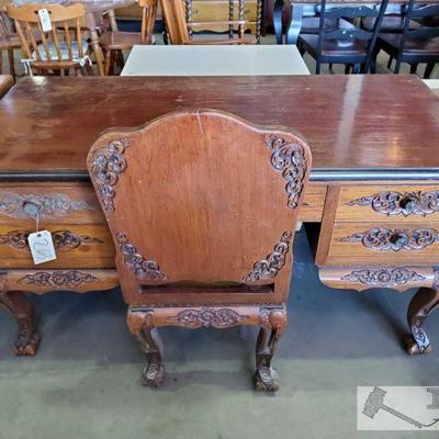 263: Antique Carved Wood Desk With Chair
Antique five drawer Carved Wood Desk With wood Chair
