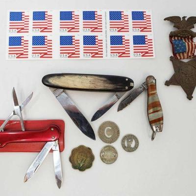 Three Folding Knifes, 17 Stamps, Grand Army of the Republic Medal and Bus tokens
Three Folding Knifes, 17 Stamps, Grand Army of the...
