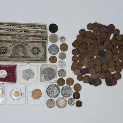 Two .900 Silver Quarters, Misc. Foreign Bills and Coins and approx. 110 Wheat Pennies
Two .900 Silver Quarters, Misc. Foreign Bills and...