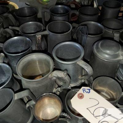 2061:Large Lot of Pewter Dishware and Mugs
Large Lot of Pewter Dishware and Mugs
