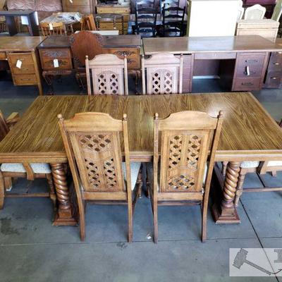 246: Wooden Dining Room Table Set w/ Six Chairs and Table Leaf
Wooden Dining Room Table Set w/ Six Chairs and Table Leaf