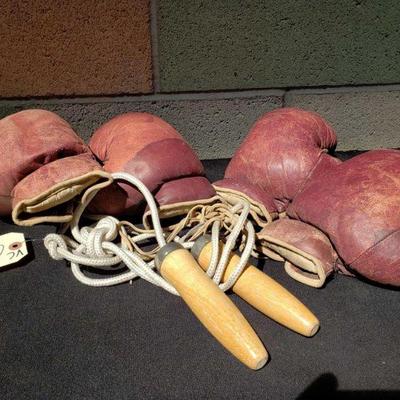 981-2 Pairs of Vintage Boxing Gloves and a Jump Rope
2 Pairs of Vintage Boxing Gloves and a Jump Rope