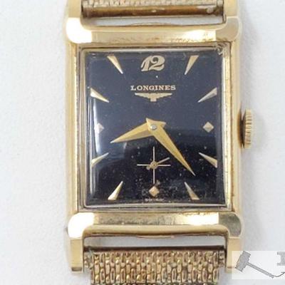 634: 14k Gold Longines Watch Case and 10k GF Band, 55.9g
Weighs approx 55.9g GF- Gold Faced Measures approx 20mm