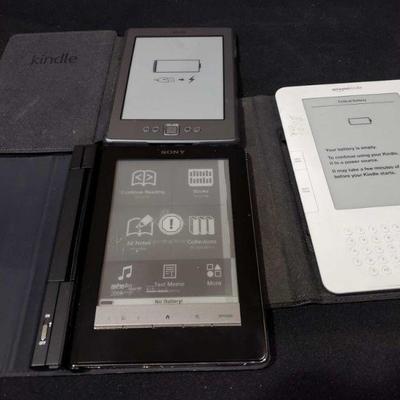 901: 2 Amazon Kindles, and 1 Sony Reading Tablet
2 Amazon Kindles, and 1 Sony Reading Tablet