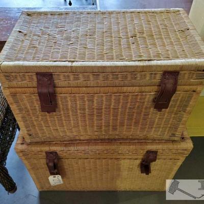 272: 	
Two Wicker Storage Trunks
One Trunk is larger than the other, Both Wicker Material with a leather type Strap Set