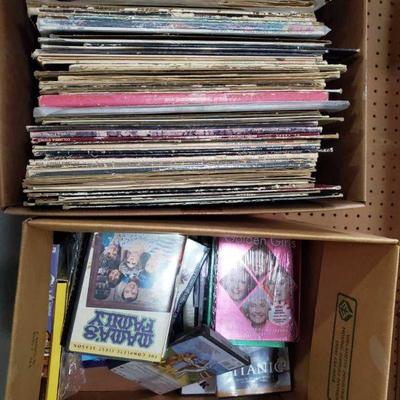 1232:1 Box of Records and 1 Box of DVDs
DVDs include The Golden Girls, Moonstruck, Mommie Dearest, Mama's Family and more! Records...