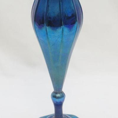Handsome Tiffany flower form vase in a lustrous iridescent blue, rising to a height of 9 inches. Ten defined ribs encircle the form...
