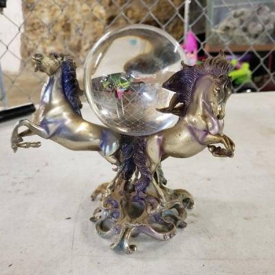 Beautiful Metal Unicorns with Glass Ball in The mi ...
